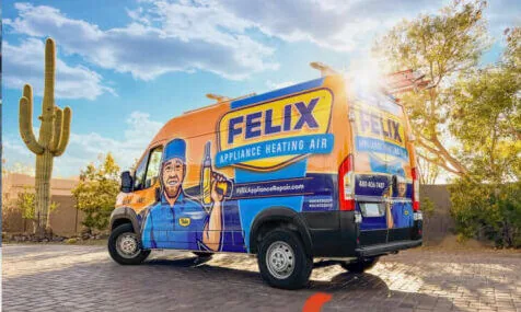 The Felix family with their wrapped service van
